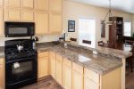 Fully Equipped Kitchen with Breakfast Bar